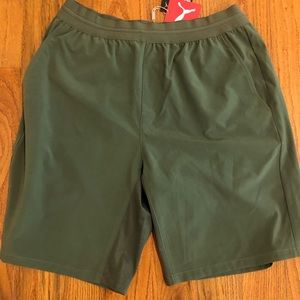 Puma men’s tech shorts with tags attached